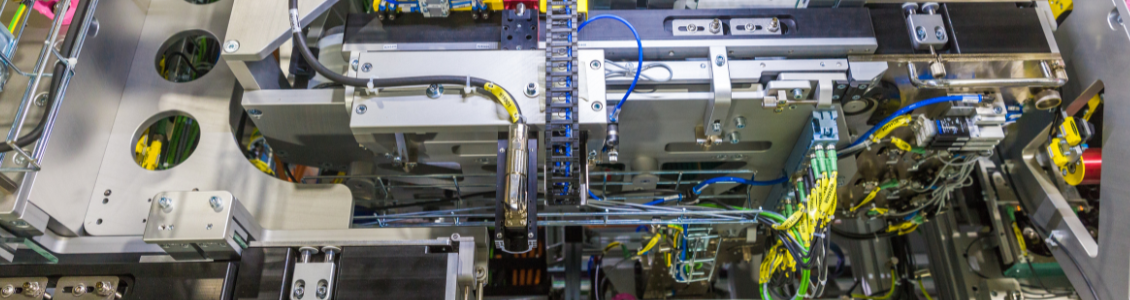 Detail view of an automated special-purpose machine with handling, assembly and wiring systems for industrial production processes