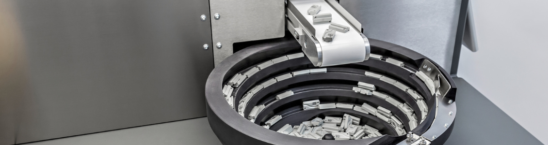 Reliable feeding technology for automated production processes Vibratory bowl feeder for automated component feeding