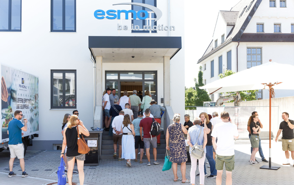 Visitors enter the esmo building during the Open House in Rosenheim.
