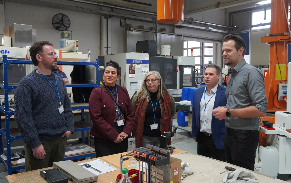 US delegation touring the production and automation facilities of esmo AG